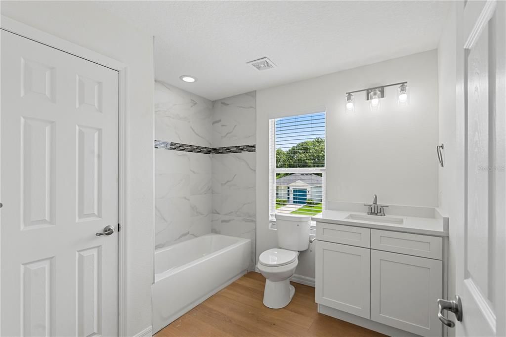 Bathroom, Interior, Marble Walls, Recessed Lighting, Wood Texture Flooring