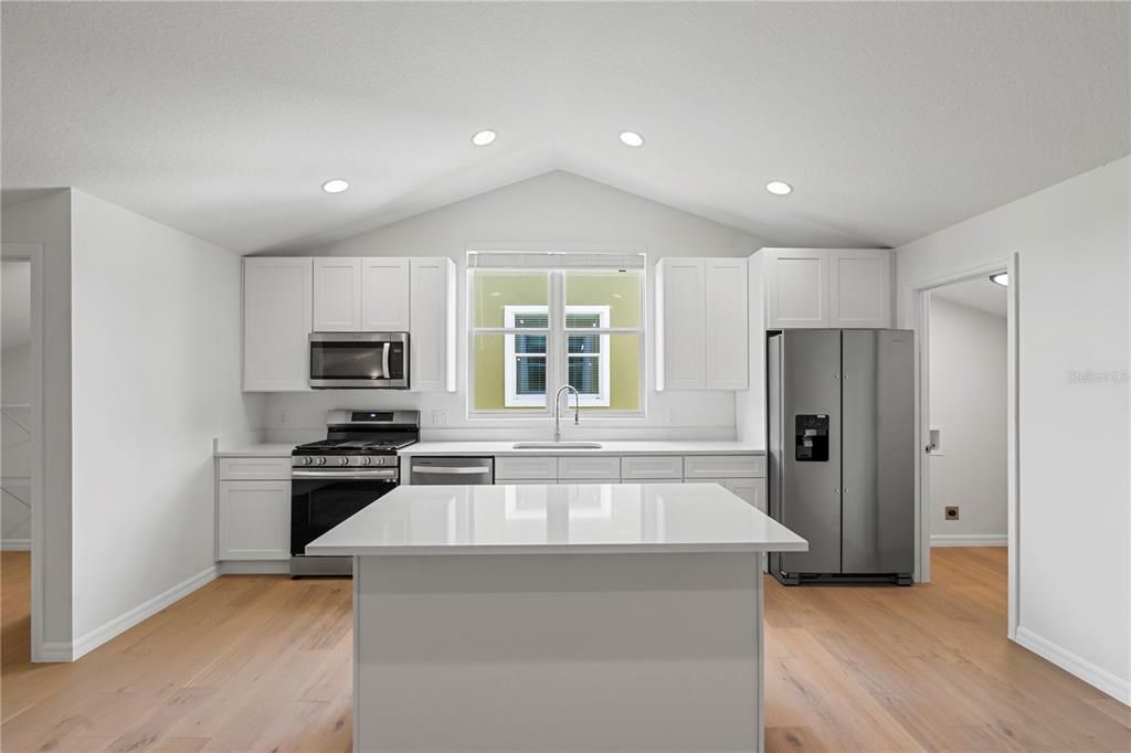 Interior, Kitchen, Recessed Lighting, Stainless Steel Appliances, Wood Texture Flooring