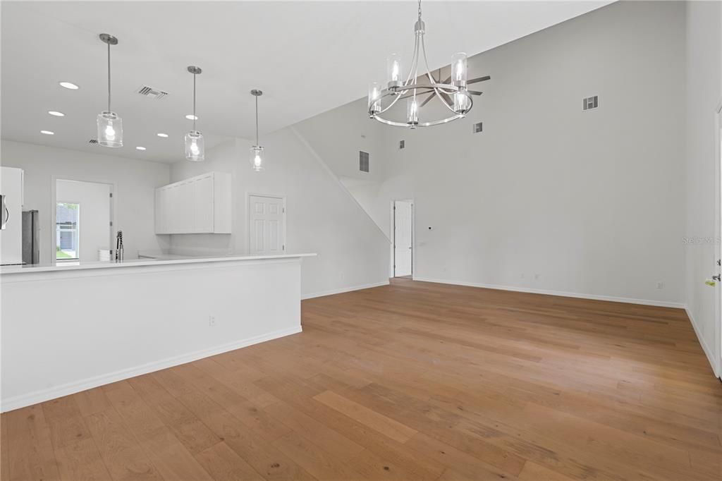 Chandelier, Empty room, Interior, Pendant Lights, Recessed Lighting, Wood Texture Flooring