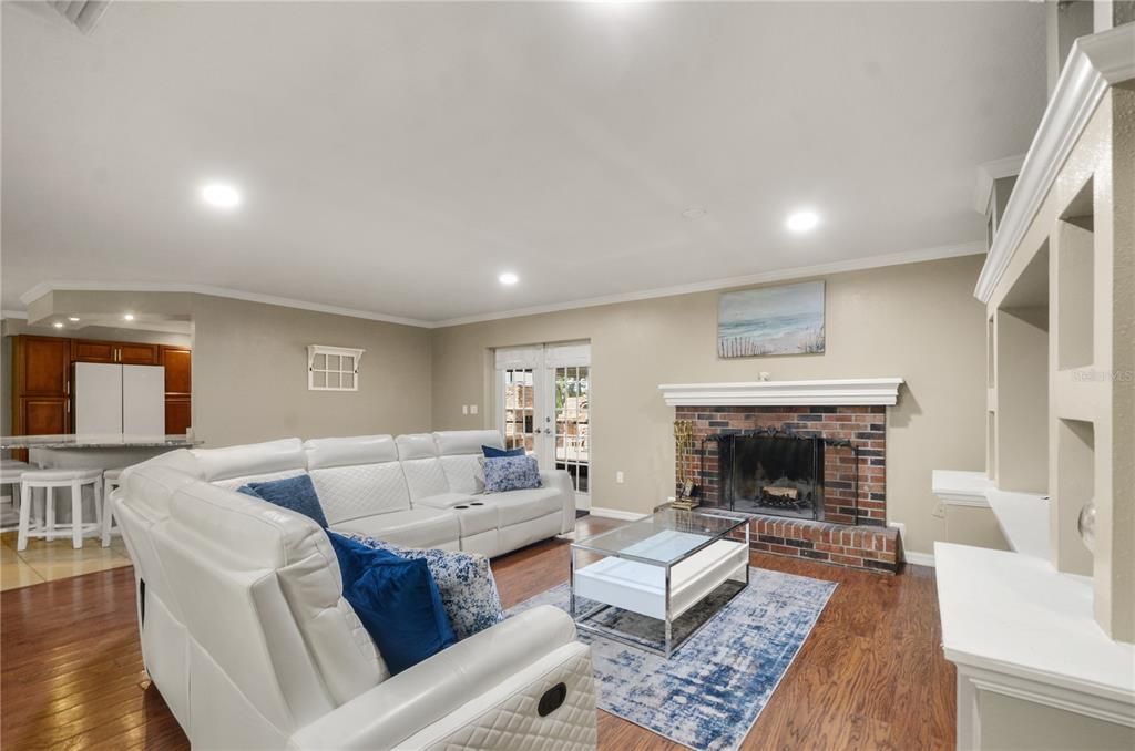 Fireplace, Interior, Kitchen, Living room, Recessed Lighting, Wood Texture Flooring