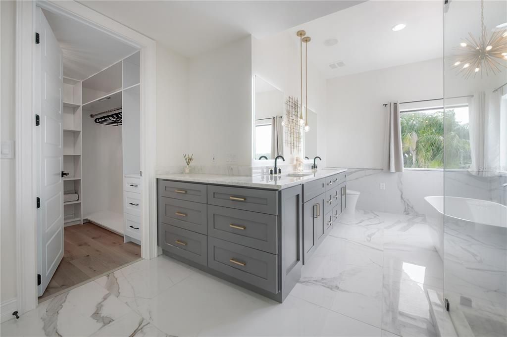 Bathroom, Dual Sink Vanities, Interior, Marble, Pendant Lights, Recessed Lighting, Walk-in Closets