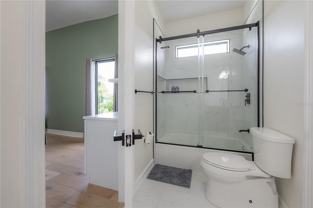 Bathroom, Glass Shower, Interior, Marble Walls, Wood Texture Flooring