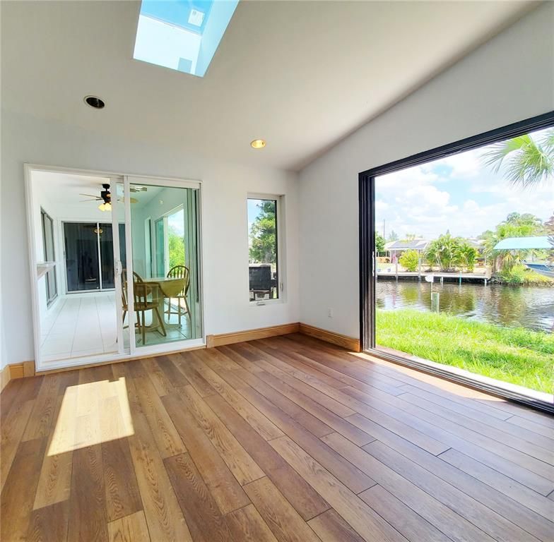 Empty room, Interior, Recessed Lighting, Water, Wood Texture Flooring