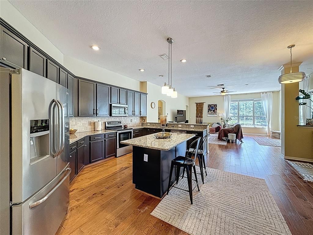 Interior, Kitchen, Living room, Pendant Lights, Recessed Lighting, Stainless Steel Appliances, Wood Texture Flooring