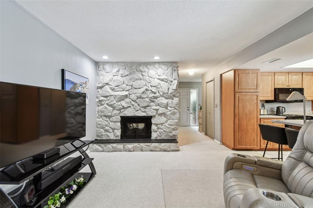Dining room, Fireplace, Interior, Kitchen, Living room, Recessed Lighting, Stone Walls
