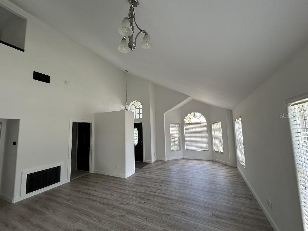 Empty room, Fireplace, Interior, Pendant Lights, Wood Texture Flooring