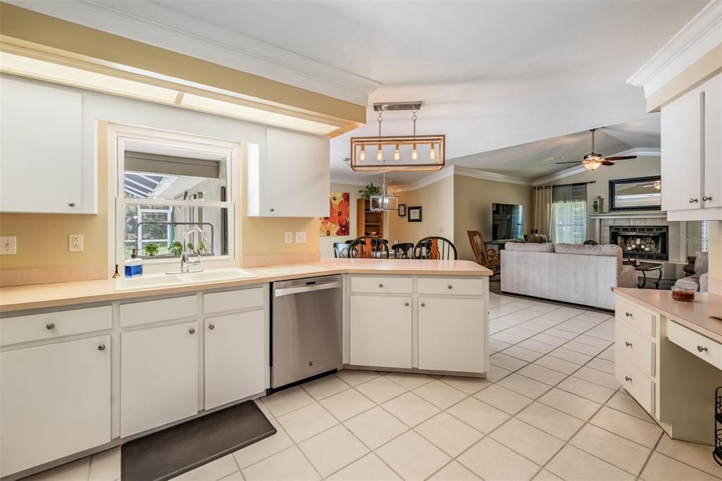 Dining room, Fireplace, Interior, Kitchen, Living room, Pendant Lights, Stainless Steel Appliances