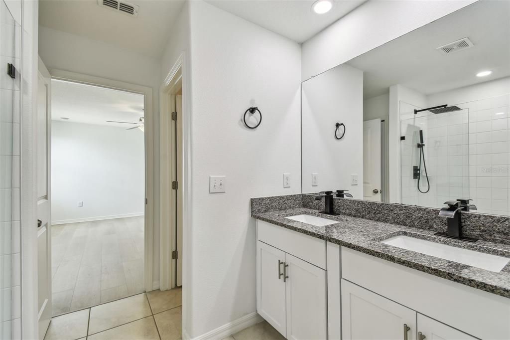 Bathroom, Dual Sink Vanities, Interior, Recessed Lighting, Wood Texture Flooring