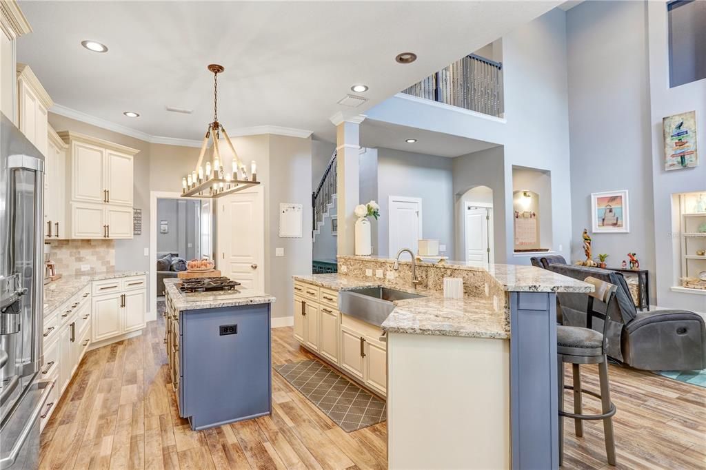 Chandelier, Interior, Kitchen, Pendant Lights, Recessed Lighting, Stainless Steel Appliances, Wood Texture Flooring