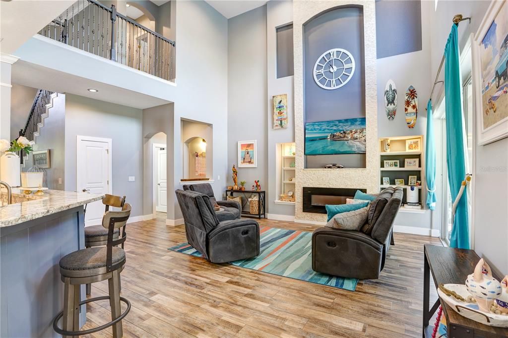 Fireplace, Interior, Living room, Recessed Lighting, Wood Texture Flooring