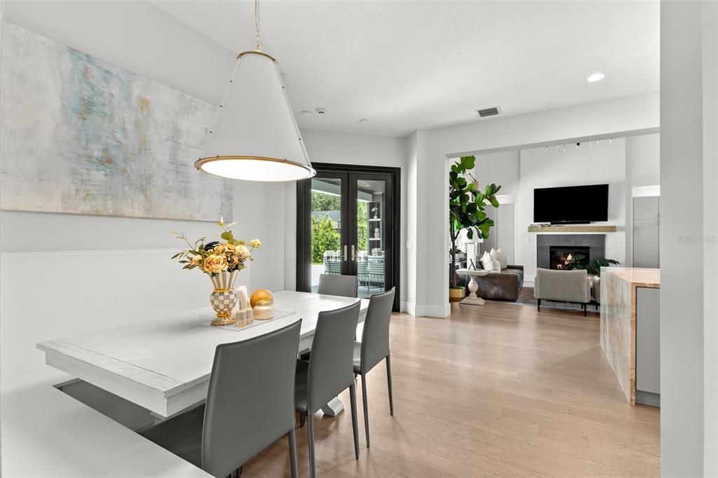 Dining room, Fireplace, Interior, Living room, Pendant Lights, Recessed Lighting, Wood Texture Flooring