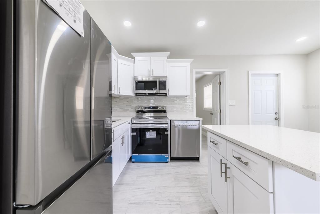 Interior, Kitchen, Marble, Recessed Lighting, Stainless Steel Appliances