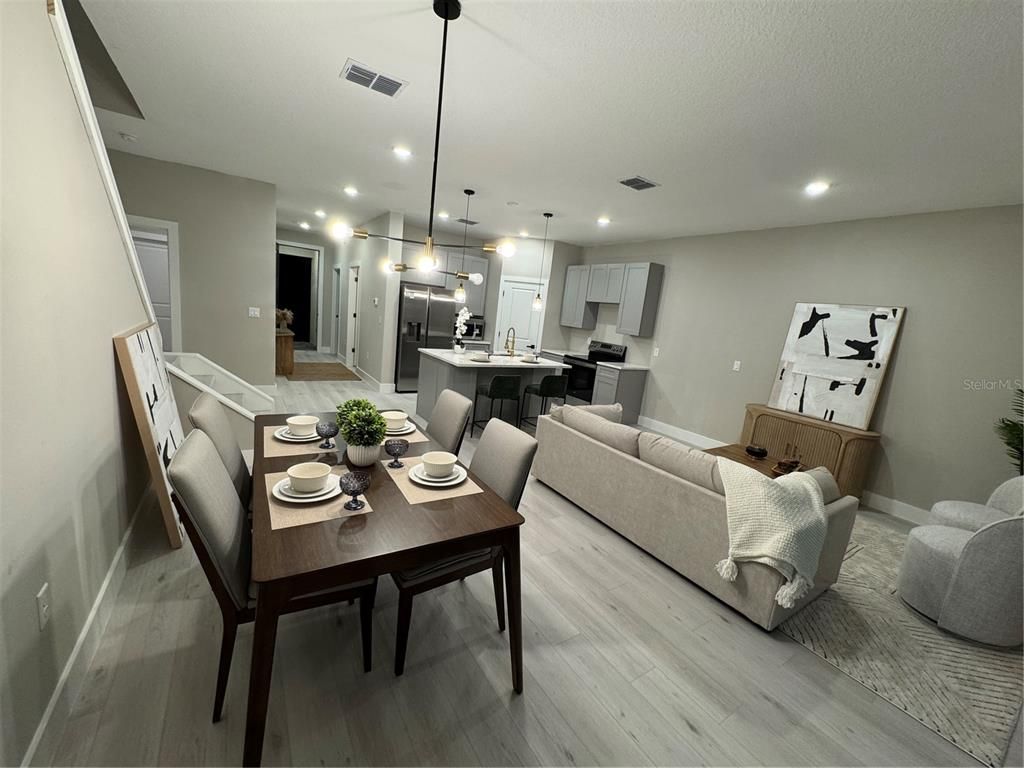 Dining room, Interior, Kitchen, Living room, Pendant Lights, Recessed Lighting, Stainless Steel Appliances, Wood Texture Flooring