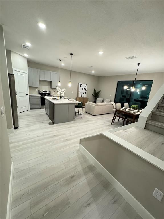 Dining room, Interior, Kitchen, Living room, Pendant Lights, Recessed Lighting, Wood Texture Flooring