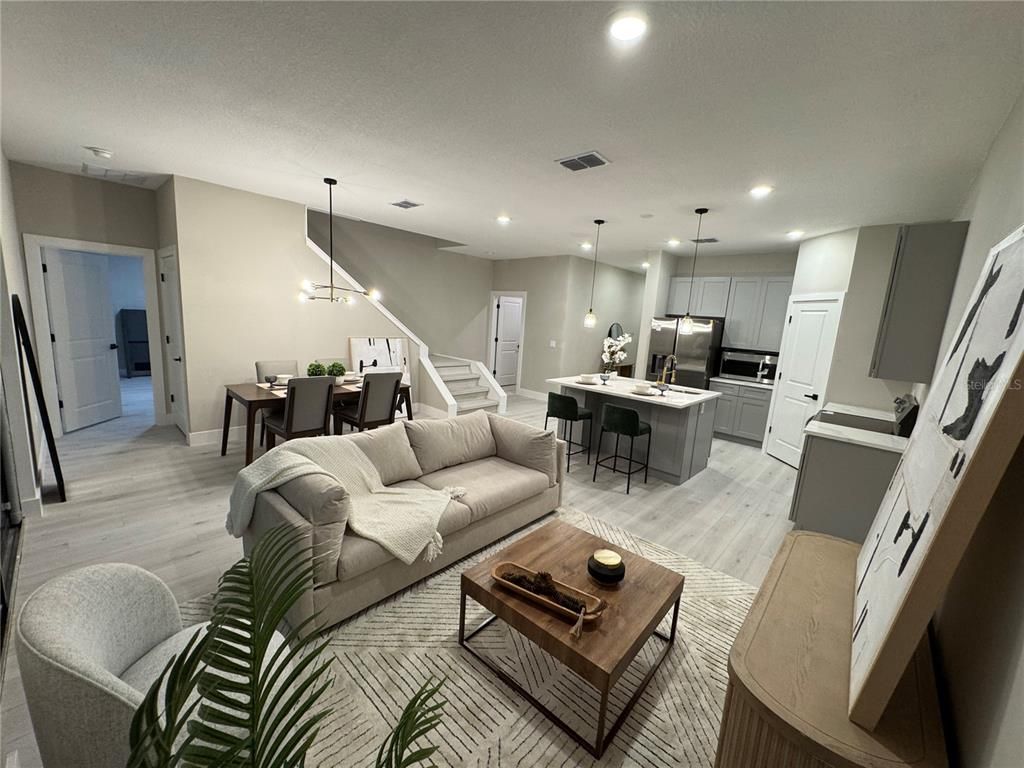 Dining room, Interior, Kitchen, Living room, Pendant Lights, Recessed Lighting, Stainless Steel Appliances, Wood Texture Flooring