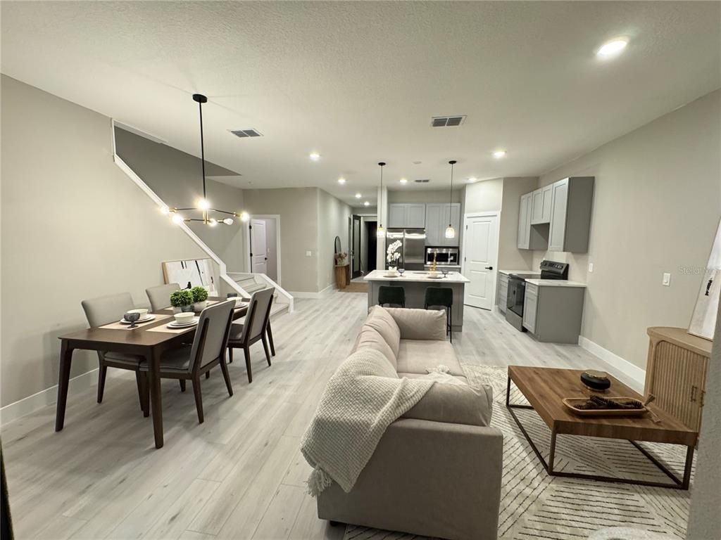 Dining room, Interior, Kitchen, Pendant Lights, Recessed Lighting, Stainless Steel Appliances, Wood Texture Flooring