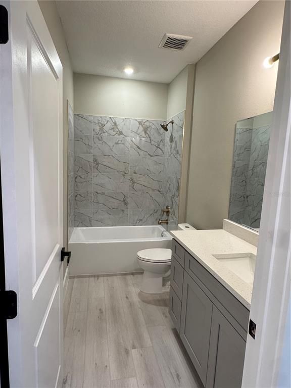 Bathroom, Interior, Marble Walls, Recessed Lighting, Wood Texture Flooring