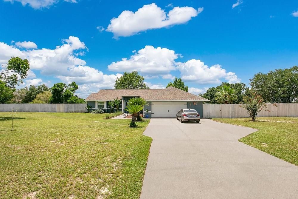 Attached, Backyard, Exterior, Facade, Brick Facade, Ranch