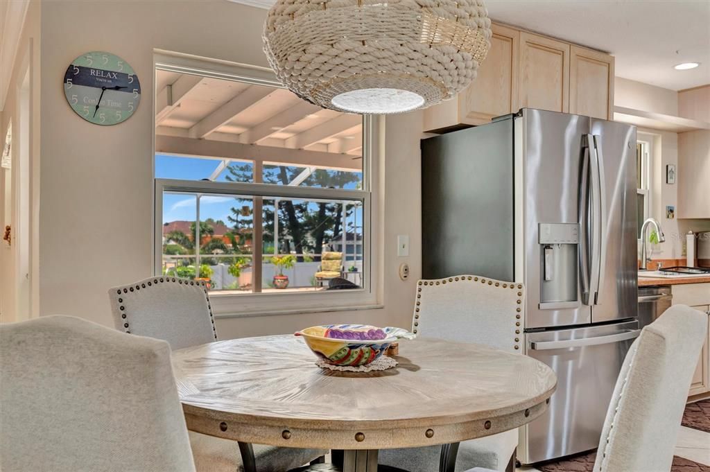 Dining room, Interior, Kitchen, Recessed Lighting, Stainless Steel Appliances, Wood Texture Flooring