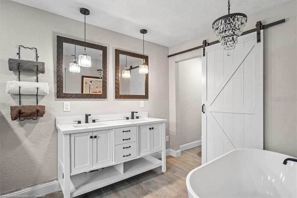 Bathroom, Dual Sink Vanities, Free Standing Baths, Interior, Pendant Lights, Wood Texture Flooring