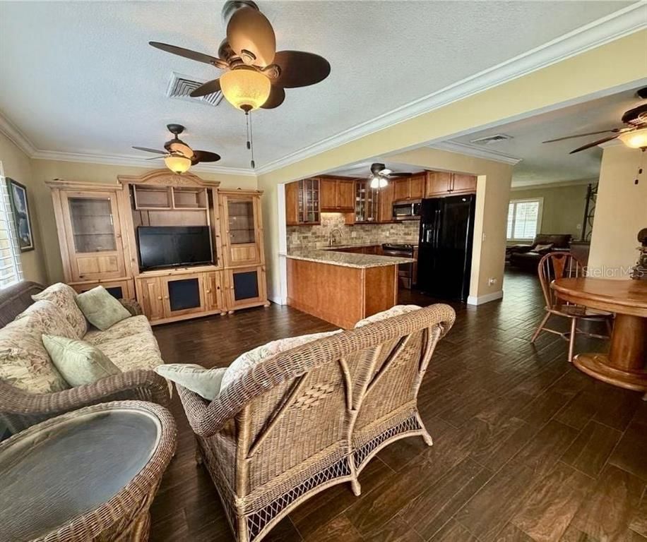 Dining room, Interior, Kitchen, Living room, Stainless Steel Appliances, Wood Texture Flooring