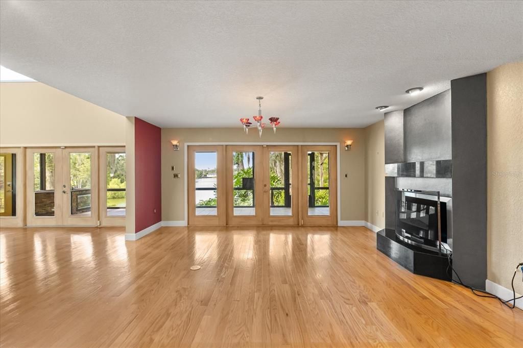 Chandelier, Empty room, Fireplace, Interior, Wood Texture Flooring