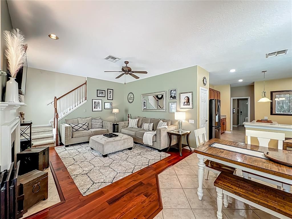 Dining room, Fireplace, Interior, Living room, Pendant Lights, Recessed Lighting, Wood Texture Flooring