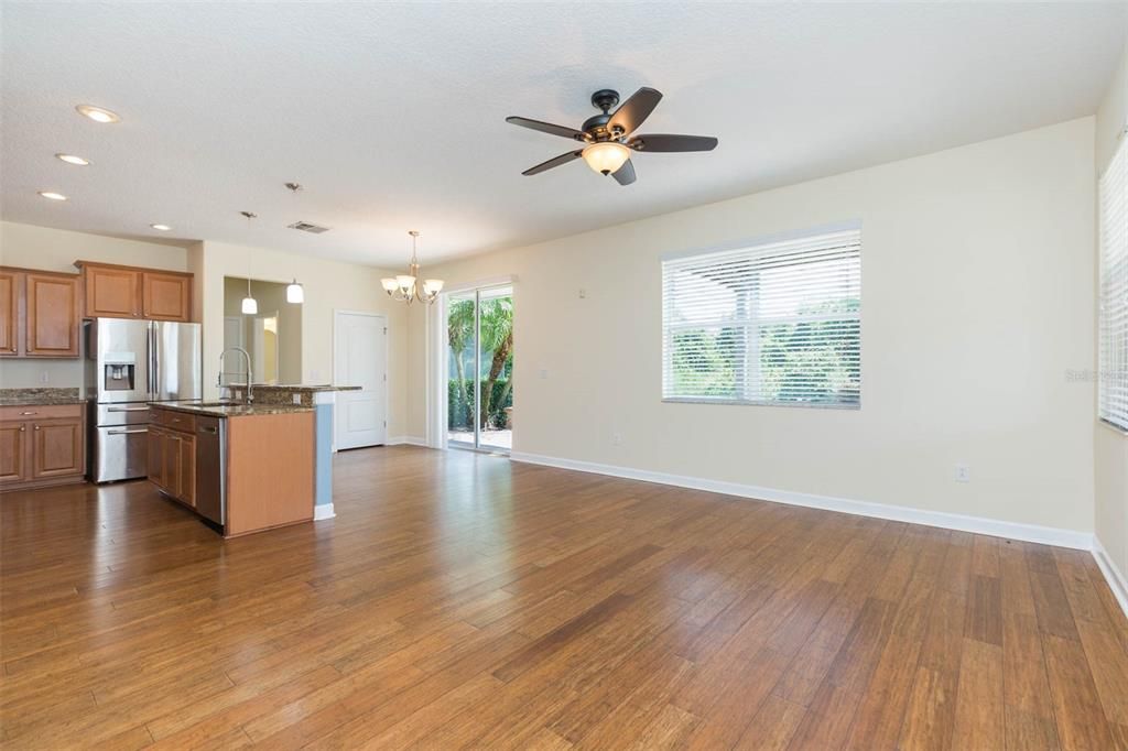Chandelier, Empty room, Interior, Kitchen, Recessed Lighting, Wood Texture Flooring