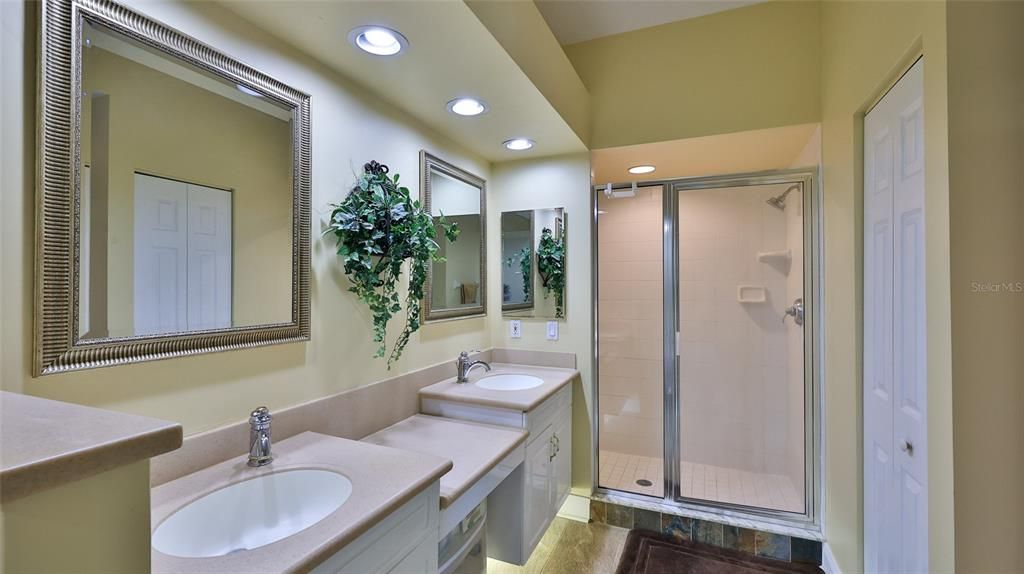 Bathroom, Dual Sink Vanities, Glass Shower, Interior, Recessed Lighting, Wood Texture Flooring