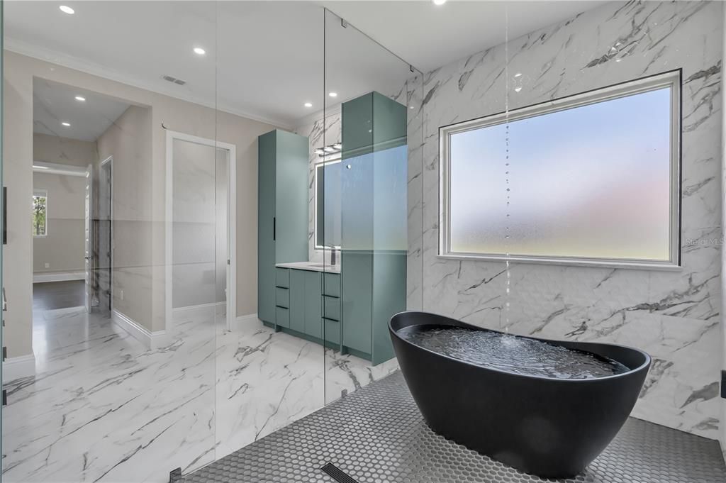 Bathroom, Free Standing Baths, Glass Shower, Interior, Marble, Marble Walls, Recessed Lighting