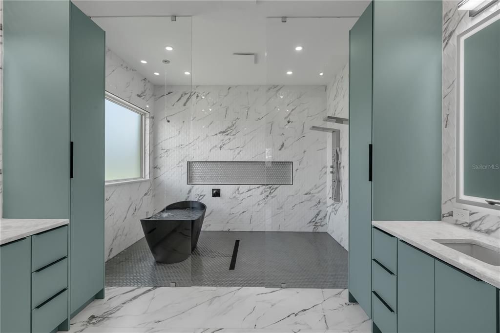Bathroom, Dual Sink Vanities, Interior, Marble, Marble Walls, Recessed Lighting