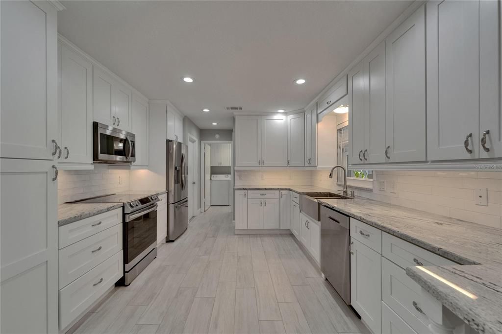 Interior, Kitchen, Recessed Lighting, Stainless Steel Appliances, Wood Texture Flooring