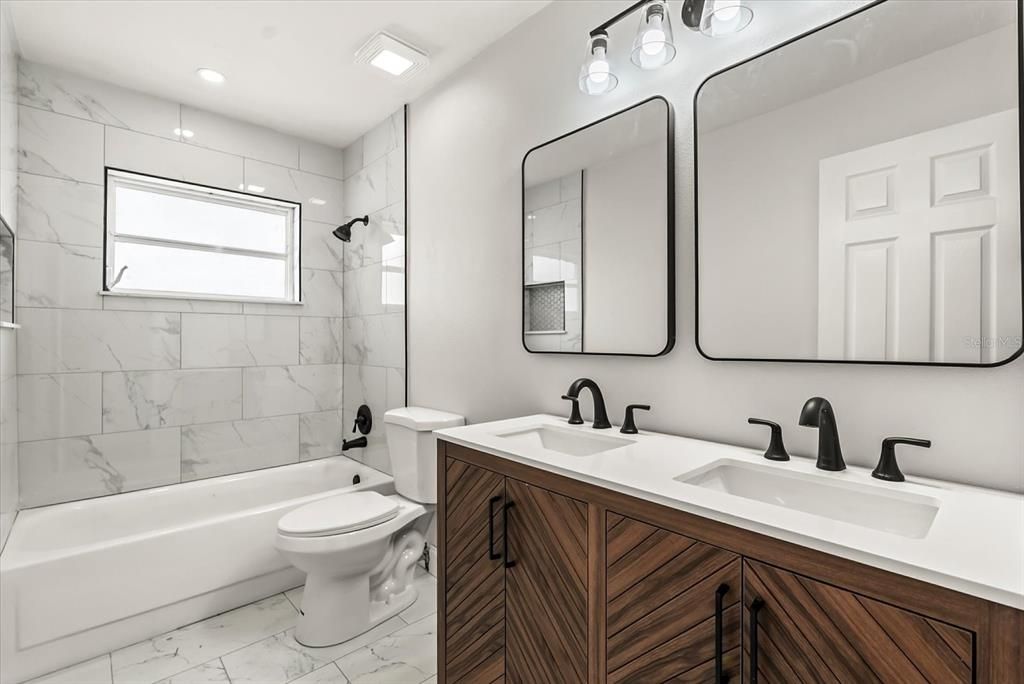 Bathroom, Dual Sink Vanities, Interior, Marble, Marble Walls, Recessed Lighting