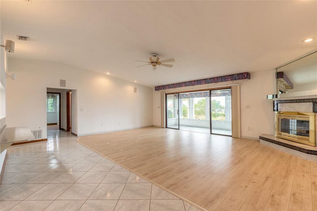 Empty room, Fireplace, Interior, Recessed Lighting, Wood Texture Flooring