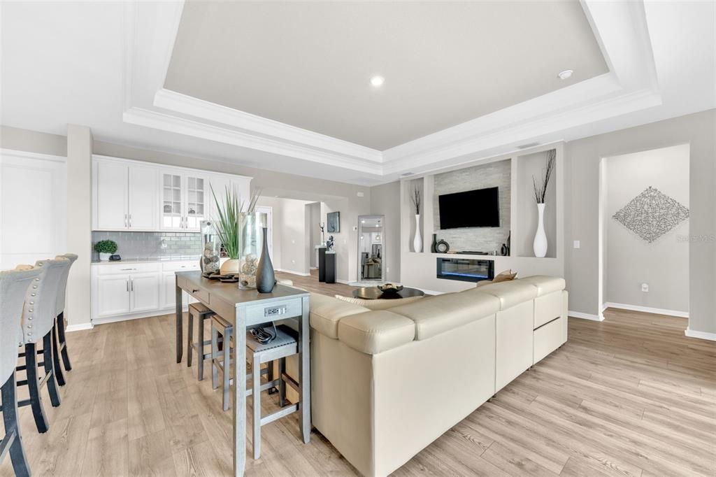Fireplace, Interior, Kitchen, Living room, Recessed Lighting, Wood Texture Flooring
