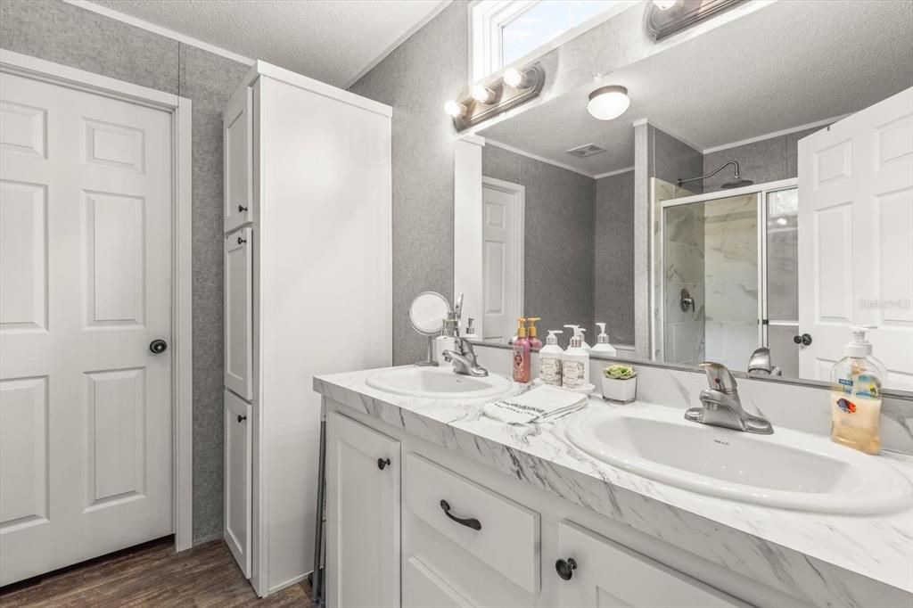 Bathroom, Dual Sink Vanities, Glass Shower, Interior, Wood Texture Flooring