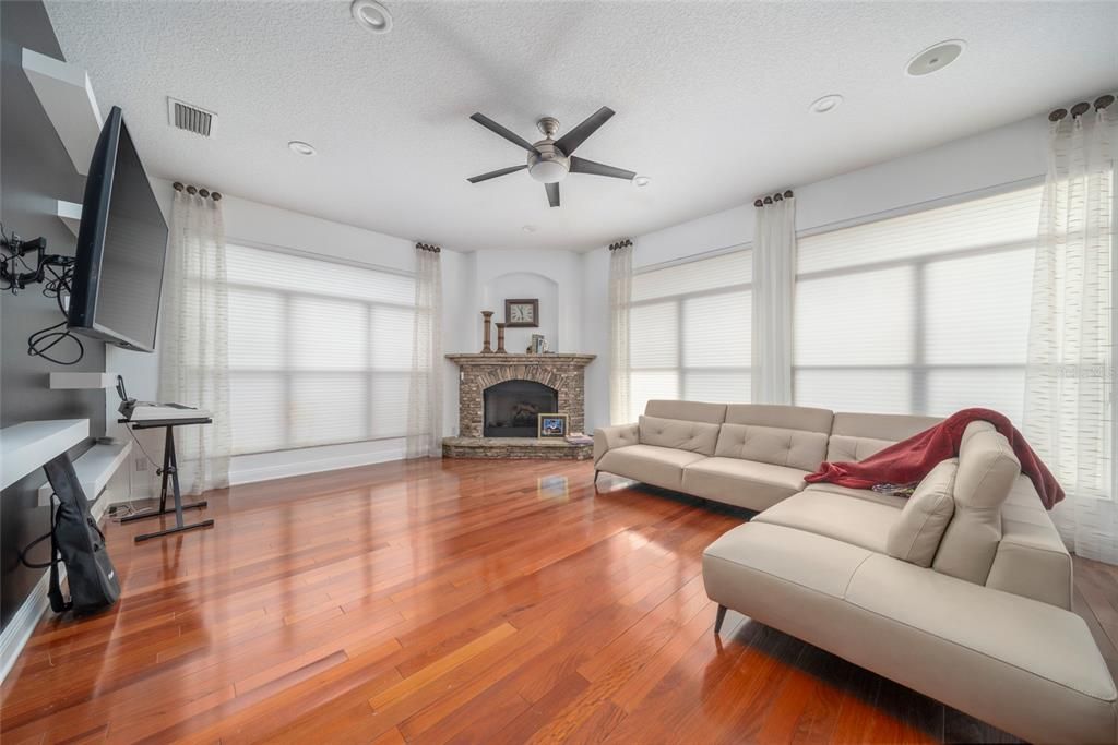 Fireplace, Interior, Living room, Recessed Lighting, Wood Texture Flooring