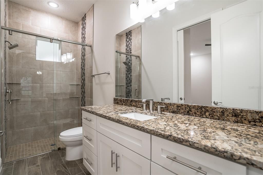 Bathroom, Dual Sink Vanities, Glass Shower, Interior, Recessed Lighting