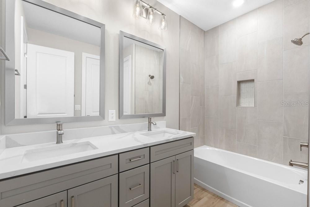 Bathroom, Dual Sink Vanities, Interior, Recessed Lighting, Wood Texture Flooring