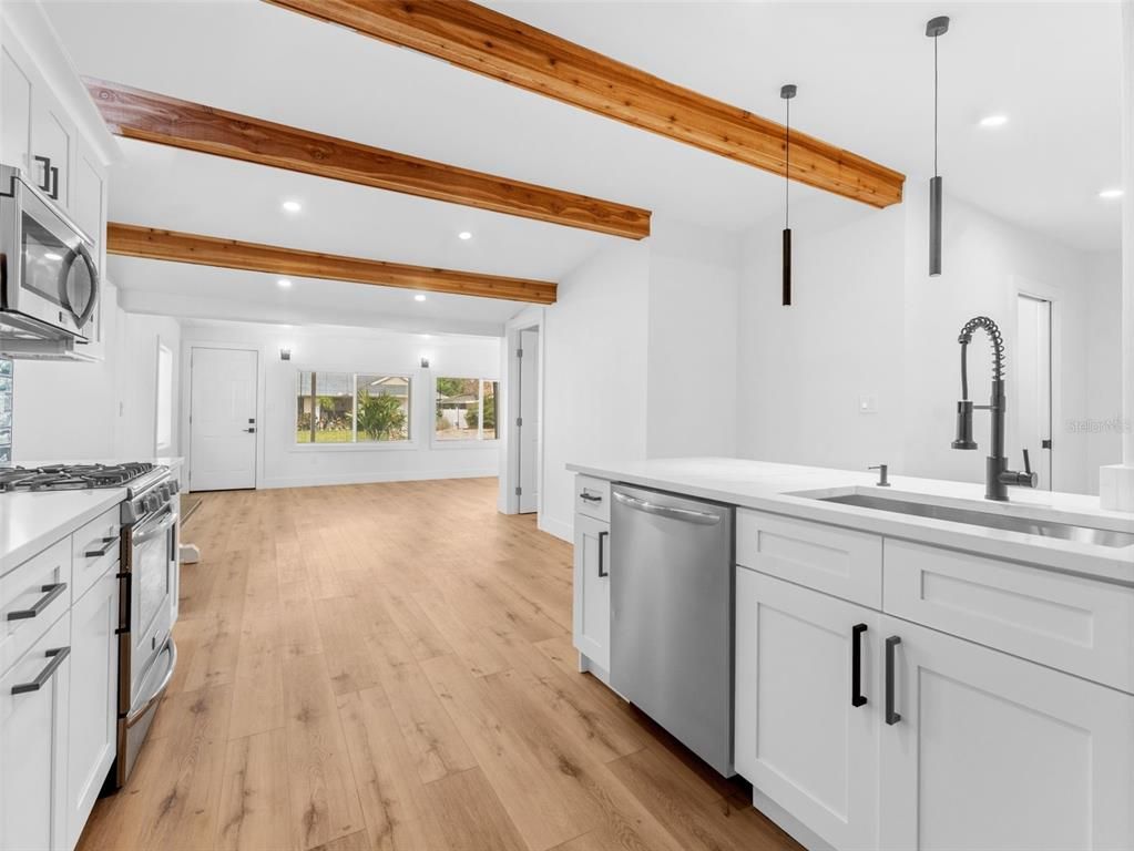 Interior, Kitchen, Pendant Lights, Recessed Lighting, Stainless Steel Appliances, Wooden Beams, Wood Texture Flooring