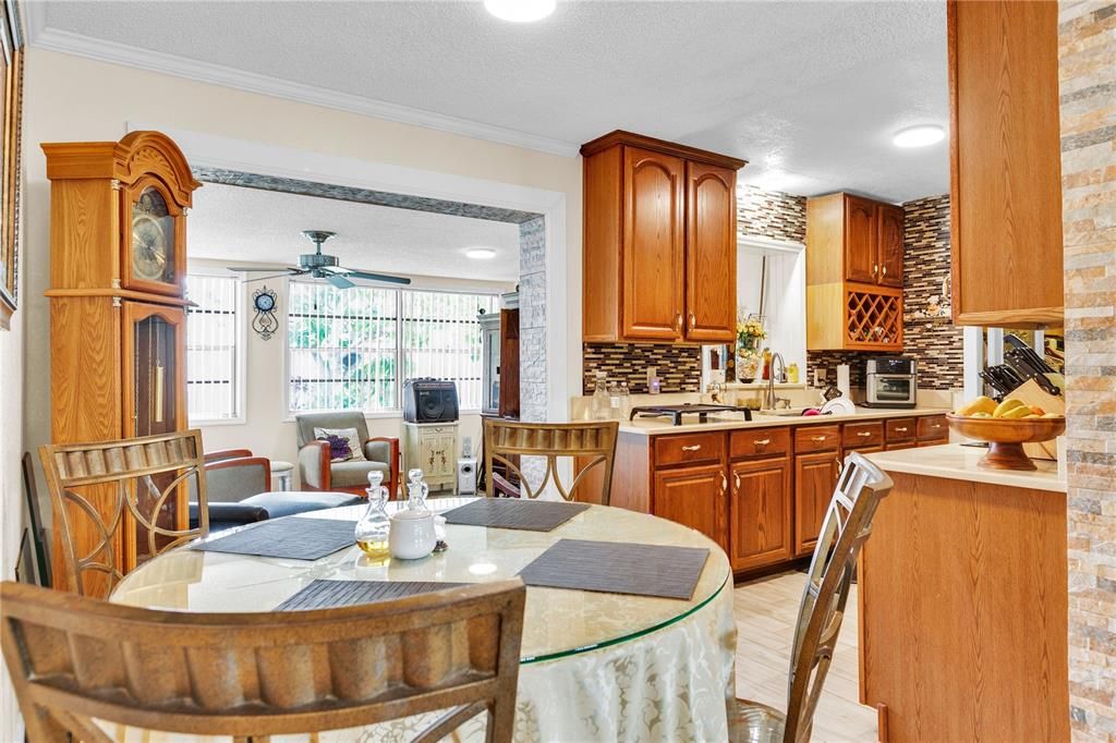 Dining room, Interior, Kitchen, Living room, Recessed Lighting, Stone Walls, Wood Texture Flooring