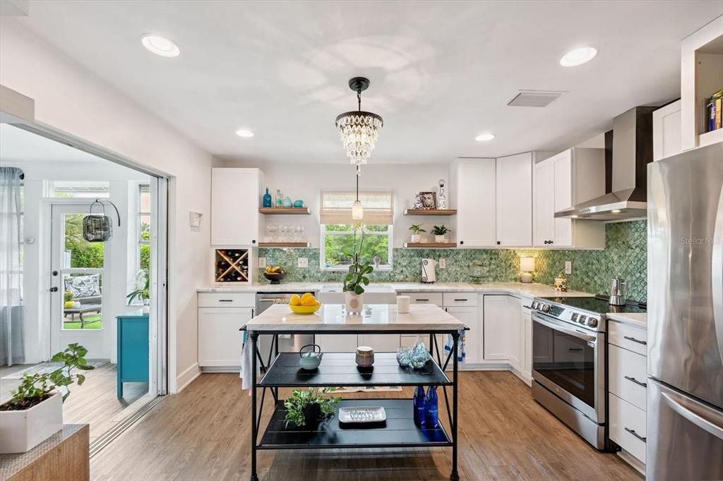 Chandelier, Interior, Kitchen, Pendant Lights, Recessed Lighting, Stainless Steel Appliances, Wood Texture Flooring