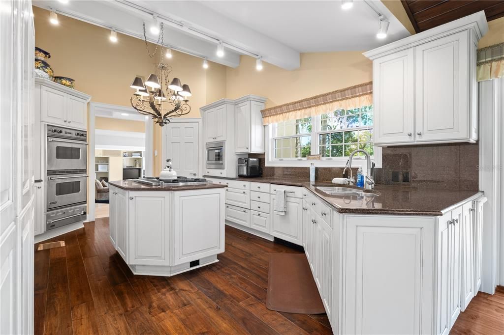 Chandelier, Interior, Kitchen, Recessed Lighting, Stainless Steel Appliances, Wood Texture Flooring