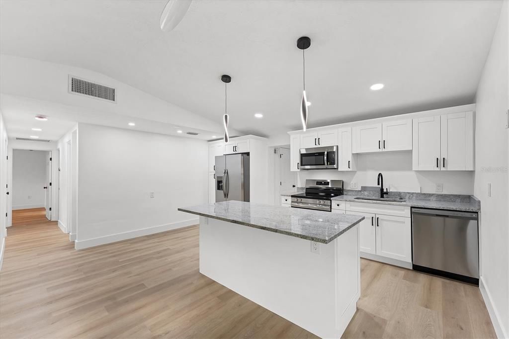 Interior, Kitchen, Pendant Lights, Recessed Lighting, Stainless Steel Appliances, Wood Texture Flooring