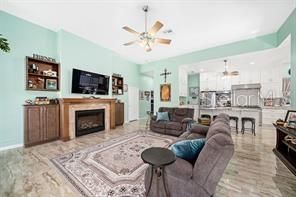 Chandelier, Dining room, Fireplace, Interior, Kitchen, Living room, Stainless Steel Appliances