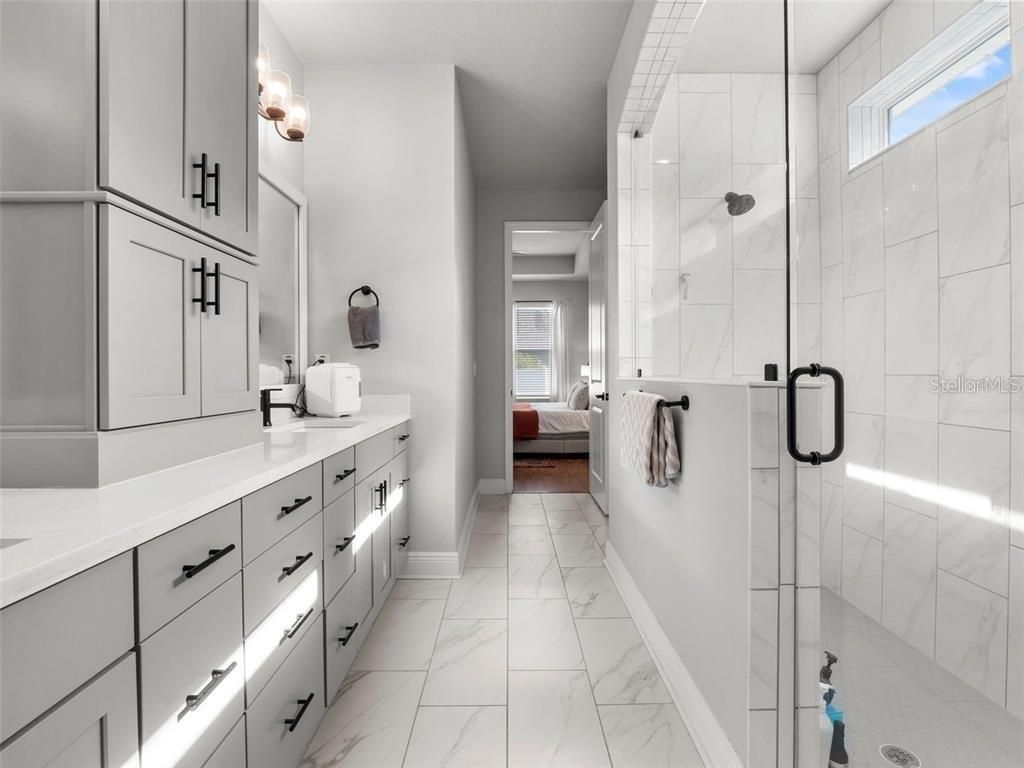 Bathroom, Dual Sink Vanities, Glass Shower, Interior, Marble, Marble Walls