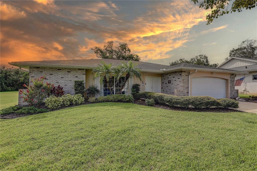 Attached, Backyard, Exterior, Facade, Brick Facade, Ranch