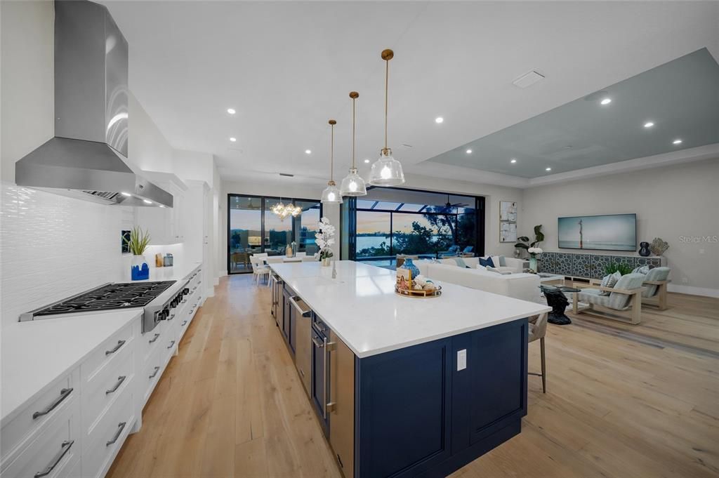 Dining room, Interior, Kitchen, Living room, Pendant Lights, Recessed Lighting, Stainless Steel Appliances, Wood Texture Flooring