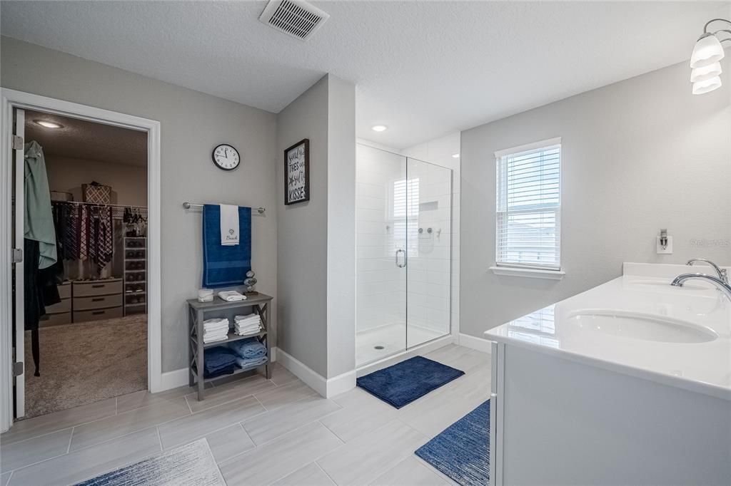Bathroom, Dual Sink Vanities, Glass Shower, Interior, Recessed Lighting, Walk-in Closets
