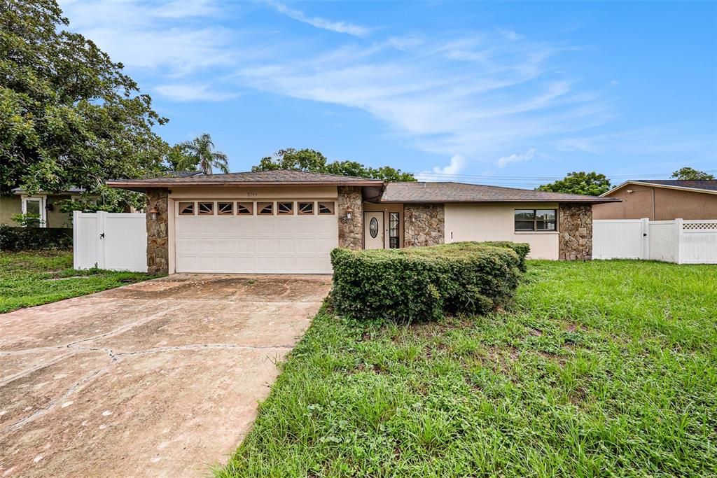 Attached, Backyard, Exterior, Facade, Brick Facade, Ranch